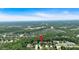 Aerial view of the property highlights its location in a lush, wooded area at 290 Prescott Dr, Acworth, GA 30101