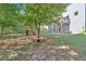 Large backyard with playground, patio, and privacy fence provides space for outdoor enjoyment at 290 Prescott Dr, Acworth, GA 30101