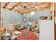 View of a basement featuring concrete walls, exposed joists and an accent rug at 290 Prescott Dr, Acworth, GA 30101