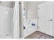 Bathroom with a shower and tub combination, and a white door at 290 Prescott Dr, Acworth, GA 30101