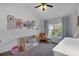 Adorable Bedroom with wooden crib, decorative wall art, and natural lighting at 290 Prescott Dr, Acworth, GA 30101