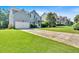 Suburban home with a wide driveway, attached garage, and classic facade design nestled in a well-kept neighborhood at 290 Prescott Dr, Acworth, GA 30101