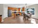 Well-equipped kitchen featuring stainless steel appliances, wooden cabinets, and an island with bar seating at 290 Prescott Dr, Acworth, GA 30101