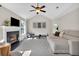 Cozy living room with a fireplace, light grey walls, and a comfortable couch at 290 Prescott Dr, Acworth, GA 30101