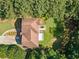 Overhead view of a home with a large backyard and surrounding mature trees at 412 Gray Fox Dr, Canton, GA 30114