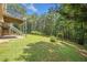 Expansive backyard with mature trees, offering a private and serene setting at 412 Gray Fox Dr, Canton, GA 30114