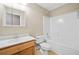 Bathroom with a single sink vanity and a tub with shower at 412 Gray Fox Dr, Canton, GA 30114