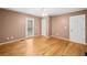 Bedroom with hardwood floors and a door leading to the outside deck at 412 Gray Fox Dr, Canton, GA 30114