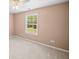 Neutral bedroom with window offering natural light at 412 Gray Fox Dr, Canton, GA 30114