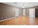 Spacious bonus room with hardwood flooring and multiple closets at 412 Gray Fox Dr, Canton, GA 30114