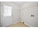Laundry room featuring tile floor, door to the outside, and wire shelving at 412 Gray Fox Dr, Canton, GA 30114