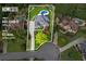 Located at 6455 Darely Ct, this 0.5 acre lot boasts lush greenery, and a backyard pool at 6455 Darely Ct, Cumming, GA 30040