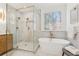 Modern bathroom features standalone tub, walk-in shower, and elegant fixtures at 6455 Darely Ct, Cumming, GA 30040
