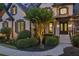 Stunning home with well-manicured shrubs leading to an elegant entry at 6455 Darely Ct, Cumming, GA 30040