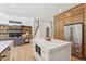Spacious kitchen with island, modern appliances, custom cabinets, and open floor plan at 6455 Darely Ct, Cumming, GA 30040