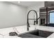 The spacious kitchen features marble countertops and stainless steel appliances at 6455 Darely Ct, Cumming, GA 30040