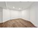 Cozy living room featuring hardwood floors, and recessed lighting at 6455 Darely Ct, Cumming, GA 30040