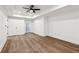 Living room featuring hardwood floors and multiple entryways at 6455 Darely Ct, Cumming, GA 30040
