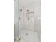 Walk-in shower with glass surround features double shower heads and sleek design at 6455 Darely Ct, Cumming, GA 30040