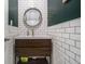 Modern bathroom with white subway tiles, a stylish vanity, and elegant fixtures at 1101 Collier Nw Rd # K5, Atlanta, GA 30318