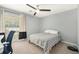 Bedroom with ceiling fan, window, and neutral colored walls at 1101 Collier Nw Rd # K5, Atlanta, GA 30318