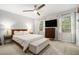 Serene bedroom with a comfortable bed, neutral decor, and ample natural light at 1101 Collier Nw Rd # K5, Atlanta, GA 30318