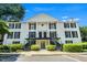 Exterior of white two-story building with black shutters at 1101 Collier Nw Rd # K5, Atlanta, GA 30318