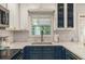Bright kitchen featuring quartz counters, a subway tile backsplash and stainless steel appliances at 1101 Collier Nw Rd # K5, Atlanta, GA 30318