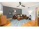 Comfortable living room with a leather sofa, stylish rug, and ample natural light at 1101 Collier Nw Rd # K5, Atlanta, GA 30318