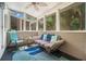 Cozy sunroom featuring comfortable seating, stylish decor, and abundant natural light at 1101 Collier Nw Rd # K5, Atlanta, GA 30318