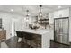 Modern kitchen with a stylish island, stainless steel appliances, and white cabinets at 1477 Spruce Dr, Smyrna, GA 30080