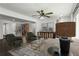Inviting living room featuring stylish furniture, a ceiling fan, and elegant decor at 1477 Spruce Dr, Smyrna, GA 30080