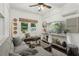 Cozy living room with large windows, exposed brick, and comfortable seating at 1477 Spruce Dr, Smyrna, GA 30080