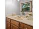Bathroom with a single sink vanity and a window providing natural light at 786 Mitsy Pt, Marietta, GA 30068