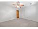 Bedroom featuring neutral walls, carpet, a door, and a closet with white doors at 786 Mitsy Pt, Marietta, GA 30068