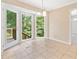 Charming breakfast area with a large window and door to deck at 786 Mitsy Pt, Marietta, GA 30068