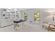 Well-lit office space with built-in shelves, carpet and two windows at 786 Mitsy Pt, Marietta, GA 30068