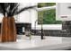 Close-up of the kitchen featuring black hardware and backsplash at 9025 Huntwood Ln, Riverdale, GA 30274