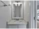 Clean and bright bathroom featuring a modern vanity with stone countertop at 3686 Claredun Ct, Cumming, GA 30040
