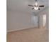 Large bedroom with neutral walls, vaulted ceiling, and a ceiling fan for comfort at 3686 Claredun Ct, Cumming, GA 30040