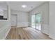 Bright dining area with wood floors and sliding glass doors to the backyard at 3686 Claredun Ct, Cumming, GA 30040