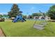 Community playground featuring slides, swing set and beautiful landscaping at 3686 Claredun Ct, Cumming, GA 30040