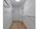Walk-in closet with carpet flooring and metal shelving for ample storage at 3686 Claredun Ct, Cumming, GA 30040
