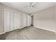 Bedroom with neutral carpet, ceiling fan, and closet at 5058 Rock Springs Rd, Lithonia, GA 30038