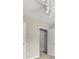 Bright bedroom with ceiling fan and closets at 5058 Rock Springs Rd, Lithonia, GA 30038