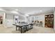 Spacious finished basement offers a ping pong table and ample space for various activities at 1363 Sylvan Ne Cir, Brookhaven, GA 30319