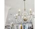 Elegant chandelier with glass and gold accents illuminates the space at 1363 Sylvan Ne Cir, Brookhaven, GA 30319
