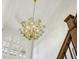 Grand foyer features a decorative chandelier, high ceilings and large windows, adding elegance and natural light at 1363 Sylvan Ne Cir, Brookhaven, GA 30319