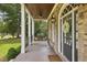 Charming brick home with a welcoming front porch featuring a porch swing and classic design at 1363 Sylvan Ne Cir, Brookhaven, GA 30319