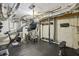 Finished basement houses a home gym with weight equipment and a punching bag at 1363 Sylvan Ne Cir, Brookhaven, GA 30319